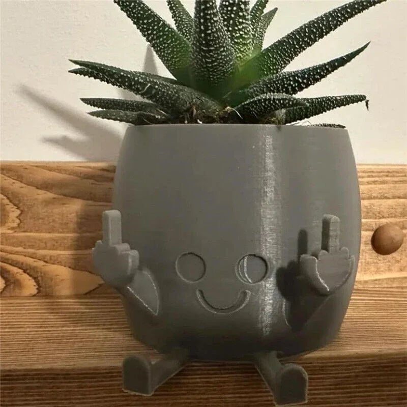 Zabawna doniczka figurka