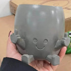 Zabawna doniczka figurka