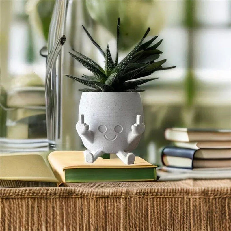 Zabawna doniczka figurka