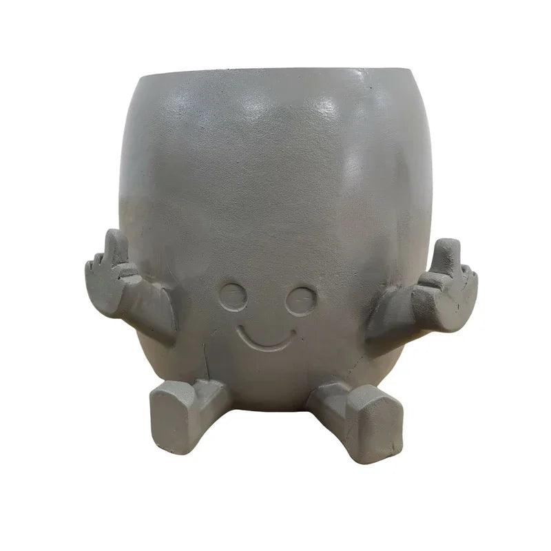 Zabawna doniczka figurka