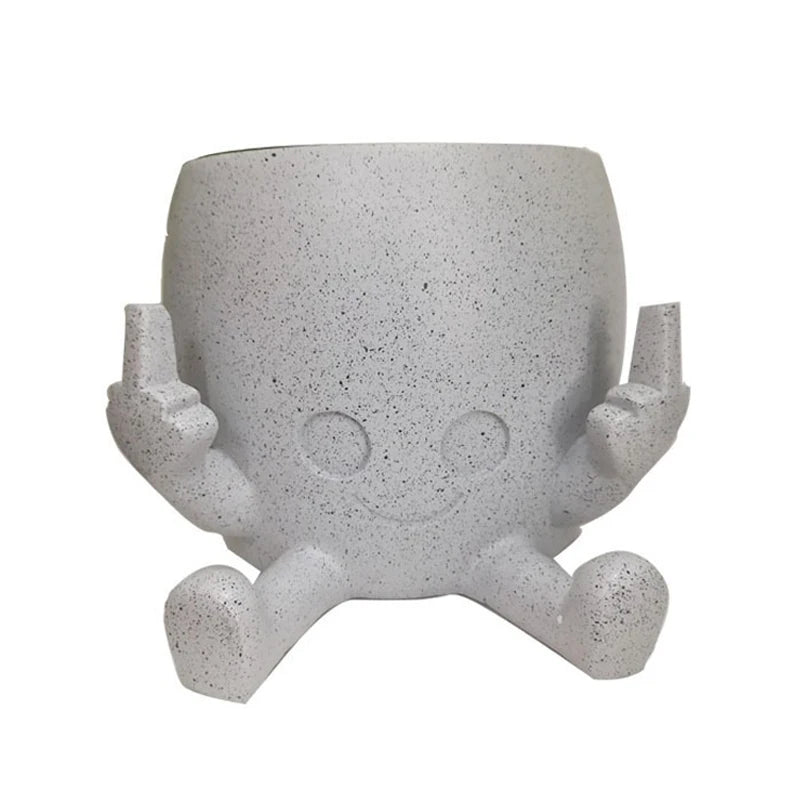 Zabawna doniczka figurka