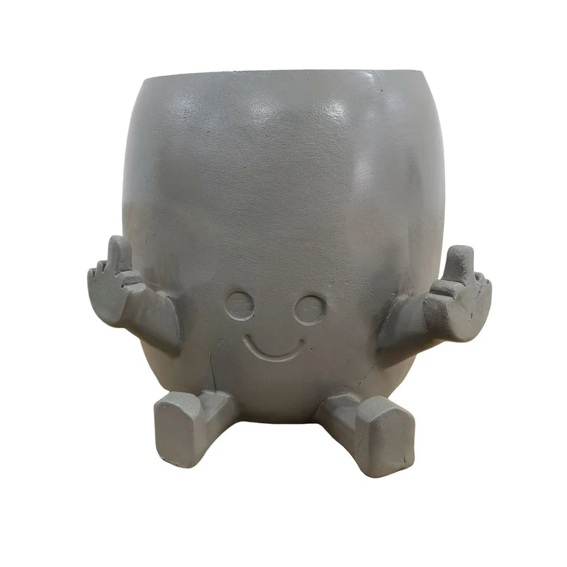 Zabawna doniczka figurka