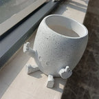 Zabawna doniczka figurka