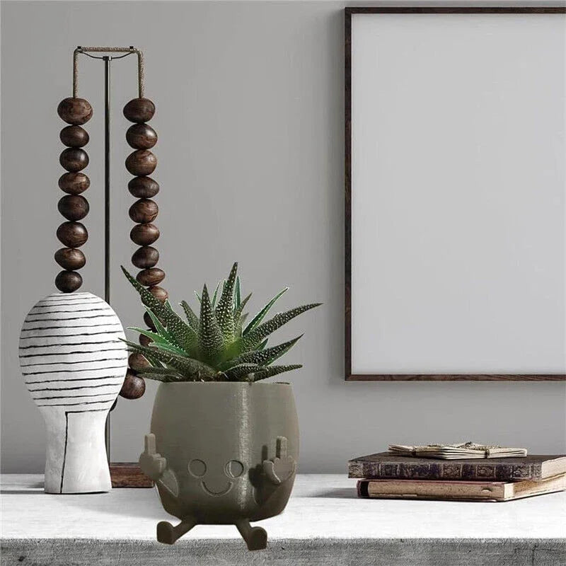 Zabawna doniczka figurka